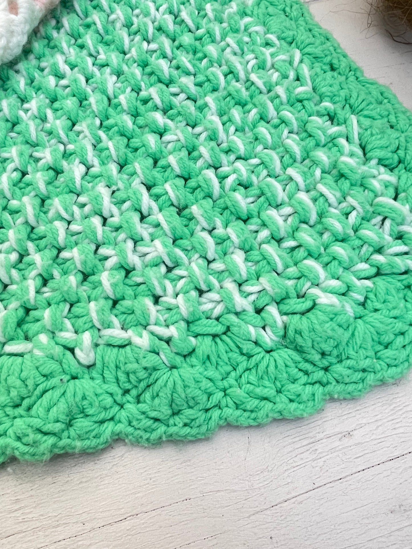 Green crocheted, baby blanket