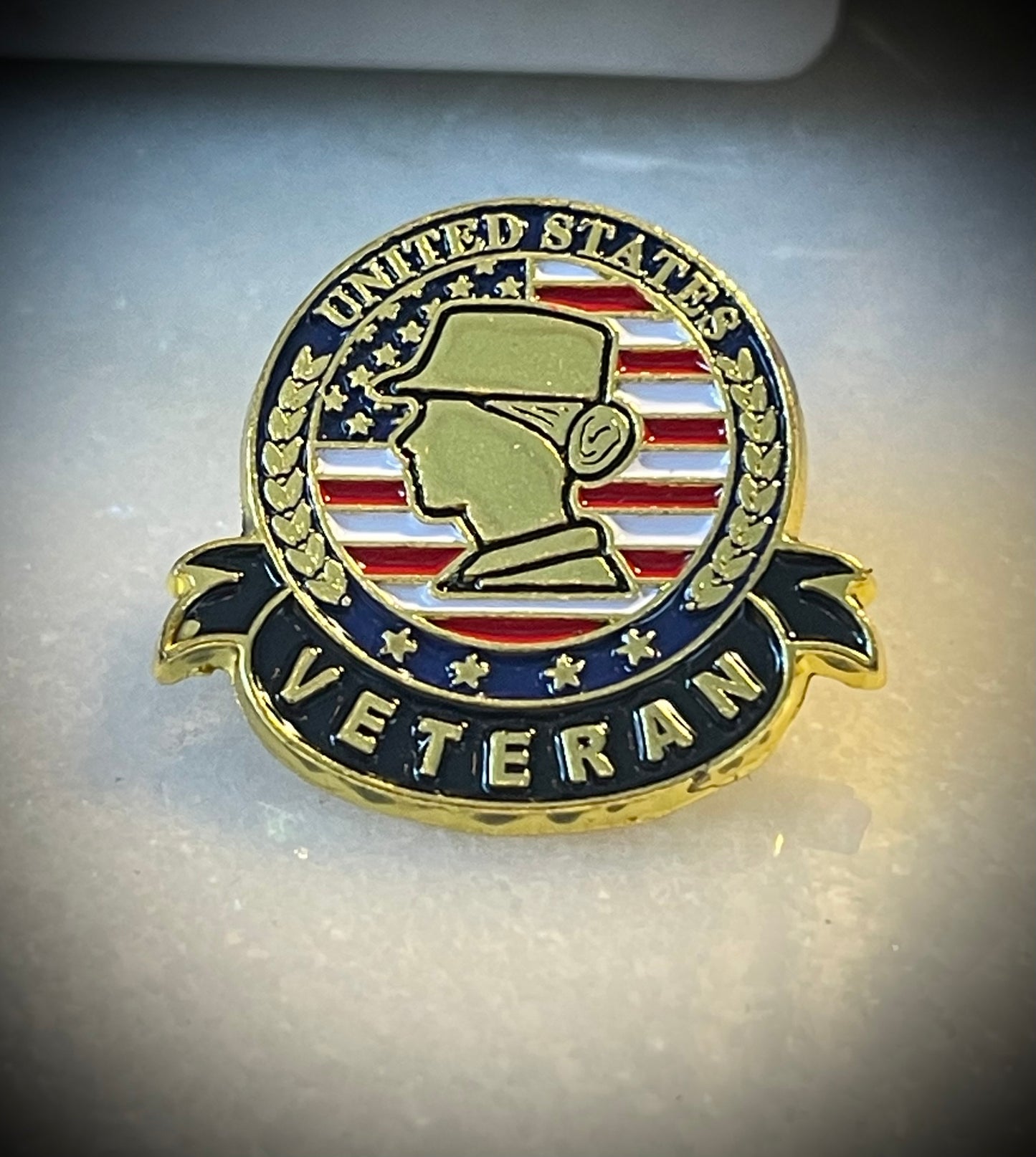 Woman, veteran pin