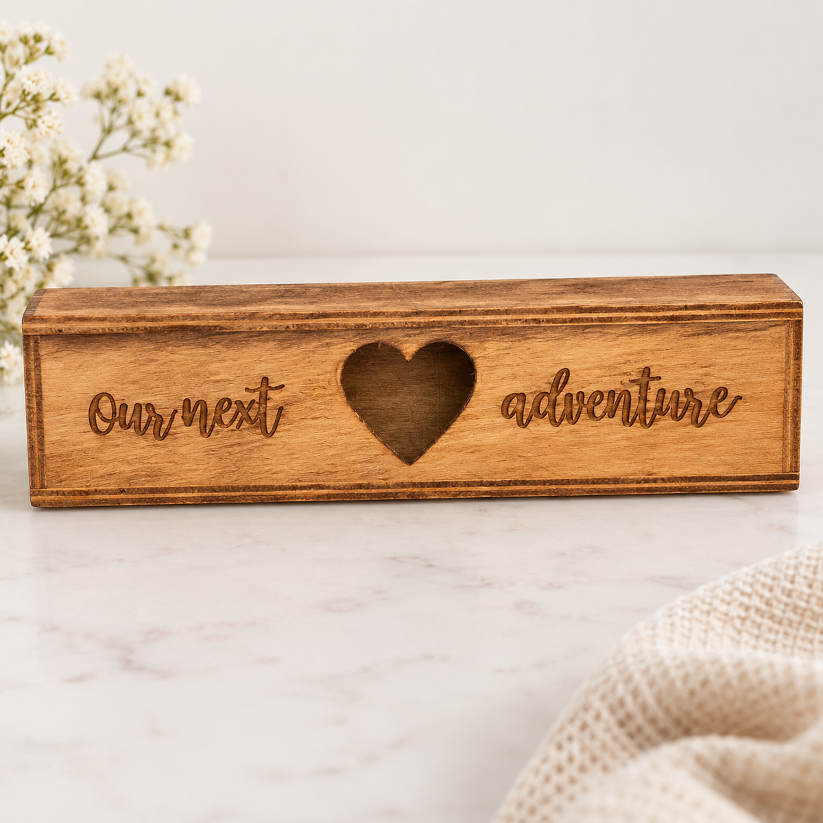 Wooden pregnancy test keepsake box engraved Our next adventure on a clean neutral background