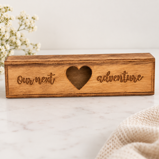 Wooden pregnancy test keepsake box engraved Our next adventure on a clean neutral background